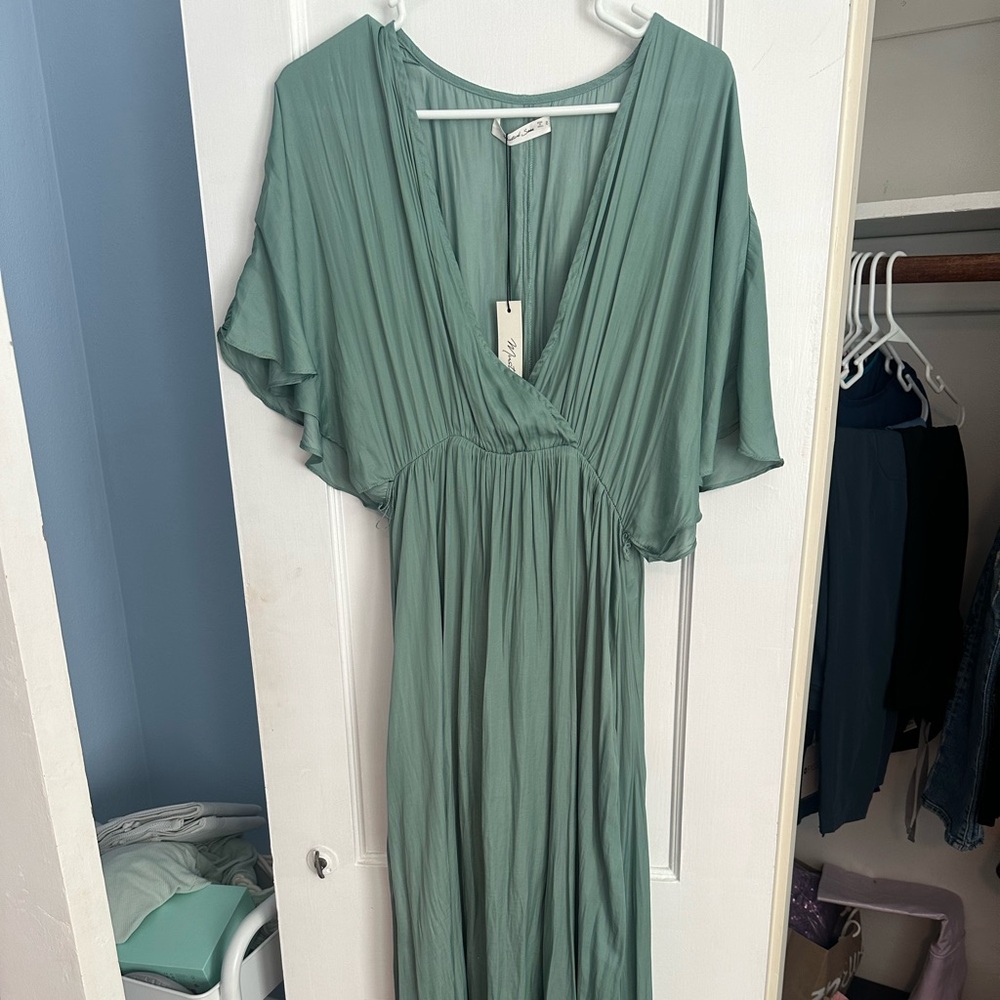 Mustard seed dress new with tag, missing sash but still beautiful.
